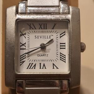 10/$20 Seville Quartz Silver/White Stainless Steel Men's Watch